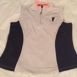 Jamie Sadock black and tan sleeveless golf shirt.